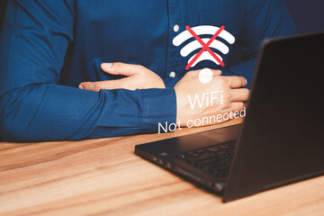 Poster - Man using a computer laptop to connect to wifi but wifi not connected, and waiting to loading digital business data form website, concept technology of waiting for connect to wifi.