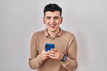 Poster - Non binary person using smartphone typing message smiling and laughing hard out loud because funny crazy joke.