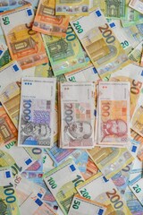 Wall Mural - Packs of various dominations of both euro and dollar