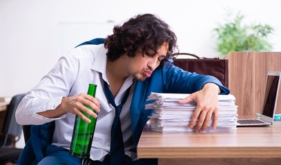 Poster - Young drunk employee in the office