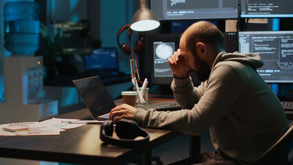 App developer feeling tired and fatigued at office job, falling asleep working on html code. Exhausted sleepy man being burnout late at night and yawning, coding security server.