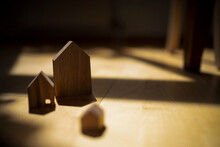 Wooden House Models On Floor At Home