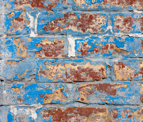 Wall Mural - weathered brick wall with peeling blue and white paint