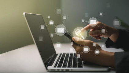Fototapete - Businessmen use laptops to searching, managing and access information  in files online document database, for efficient archiving and company data. Document Management System (DMS) concept.