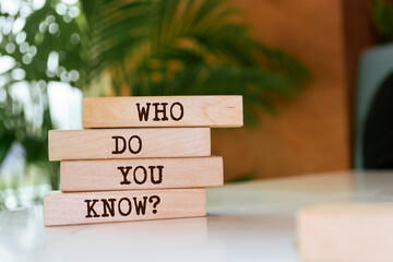 Poster - Wooden blocks with words 'Who do you know?'.