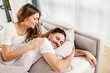 © dusanpetkovic1 - A tender woman is waking up her man in the morning in the bedroom.