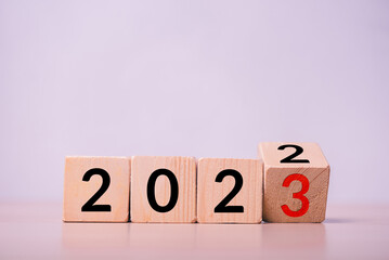 Aufkleber - row of wood cube with text new year change from 2022 to 2023