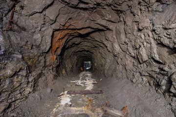 Wall Mural - Old iron gold mine underground tunnel