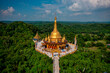 © AmazingAerialAgency - Aerial view of Bandarban temple with golden dome and big statue, Bandarban, Chittagong province, Bangladesh.