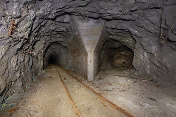 Wall Mural - Old iron ore mine underground tunnel two way drift