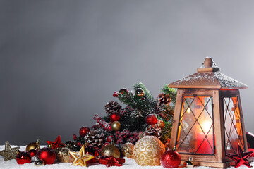 Wall Mural - Christmas card with lantern in snow