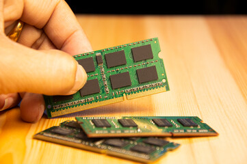 Poster - ddr3 type ram Old laptop on wooden floor