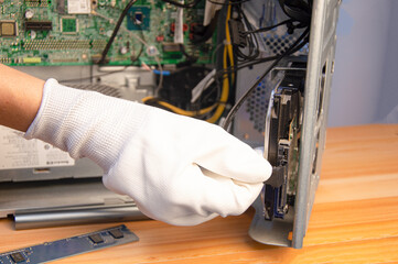 Poster - side view technician repairing computer