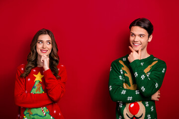 Poster - Photo of dreamy pretty best friends dressed x-mas jumpers arms chin looking empty space isolated red color background