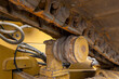 Close up of idler wheel and track of construction bulldozer