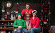 © serhii - portrait of family in christmas decoration.mom dad and son in christmas atmosphere