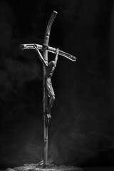 Sticker - Greyscale shot of Christ on the cross with a smoke effect