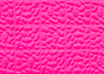 Pink texture background with organic shapes looking like pebbles