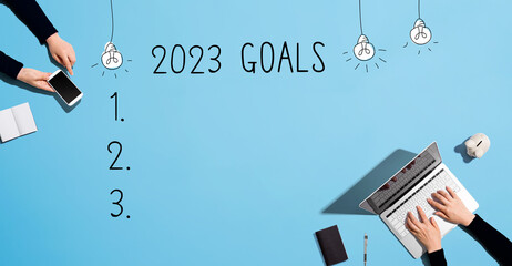 Aufkleber - 2023 goals with people working together with laptop and phone
