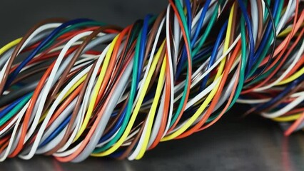 Wall Mural - Colored electric cable and wire on metallic background
