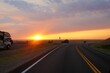 Asphalt road in a plain land on the sunset