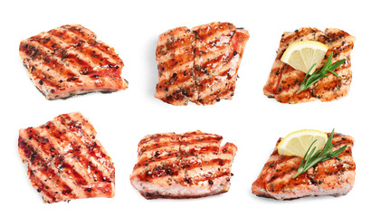 Set with tasty grilled salmon on white background