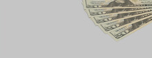 Twenty Dollar Bills On A White Surface. Savings Concept Banner With Copy-space.