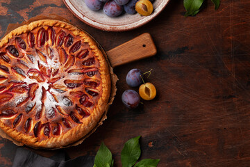 Wall Mural - Homemade plum pie. Fruit tart with seasonal fruits