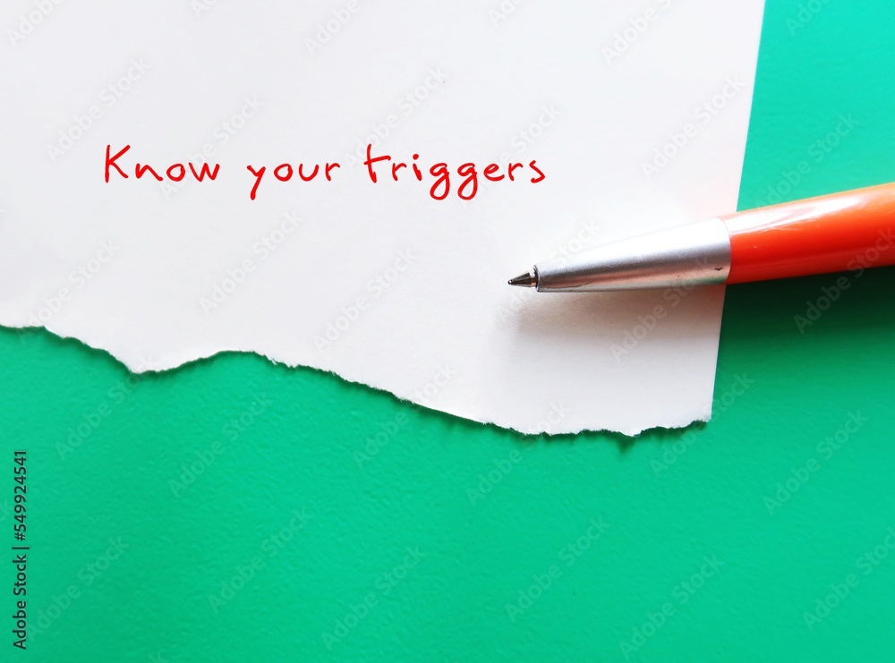 On green copy space background, pen writing on torn paper KNOW YOUR ...