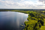 Fototapeta Na ścianę - Aerial view of lake and forest. Summer lake, aerial landscape, beautiful nature