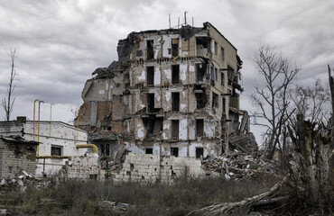 Wall Mural - destroyed and burned houses in the city Russia Ukraine war