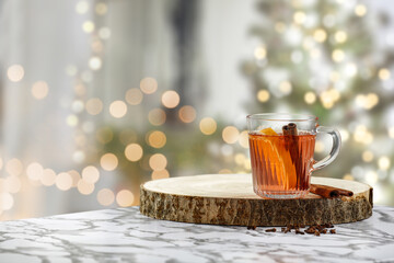 Wall Mural - Mug of hot drink and winter background. 