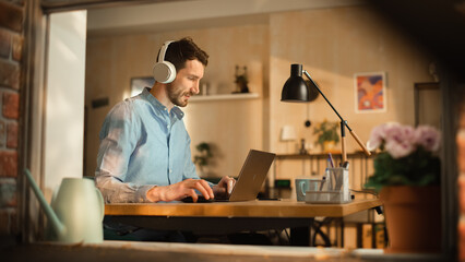 Aufkleber - Focused Stylish Professinal Wearing Headphones and Working on Laptop. Corporate Manager Uses Computer, Works with Sales Department, Does Taxes, Listens to Music. Home Office Remote Work.