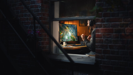 Wall Mural - Excited Middle Aged Male Gamer Playing Online Video Game on Personal Computer. Guy Enjoying Fantasy RPG Game with Role Playing Character Casting Magic Spells, Destroy Enemies. Shot from Outdoors.