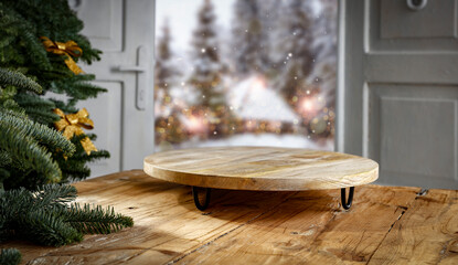 A stone table on a winter christmas evening with a free seat