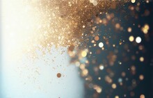 Beautiful Christmas Light Background. Abstract Glitter Bokeh And Scattered Sparkles In Gold