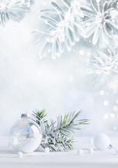 Wall Mural - winter background with snowy fir branches, pine cones and transparent christmas ball. winter or chri