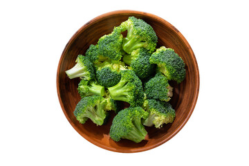 Bowl of fresh broccoli florets isolated on transparent background, top view