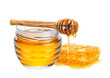 Honey isolated on white or transparent background. Jar with honey, honeycomb and honey dipper