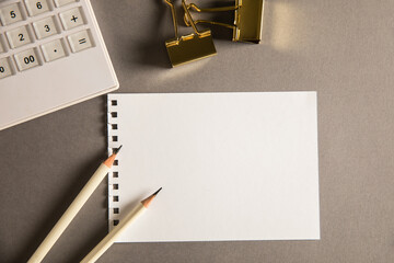 Poster - Empty paper with pencils and calculator on the table