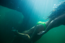 Female Exlpores Underwater Ruins In Idaho.