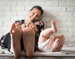 parents feet with child