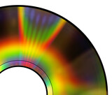 Fototapeta Tęcza - Tęczowe refleksy świetlne na płycie CD, macro, closeup