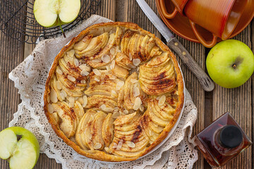 Wall Mural - French sweet apple tart with apples, cinnamon and almonds
