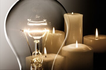 Poster - Energy concept. Glass bulb and candle