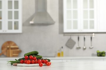 Canvas Print - Fresh clean vegetables on white table in kitchen, space for text