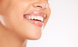 © Anela R/peopleimages.com - Teeth, dental and care for mouth with woman and smile, healthy gums and fresh breath with teeth whitening, lips against studio background. Beauty, face and skincare, dental care with wellness mock up