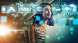 © Angelo J/peopleimages.com - Woman, digital networking and AI technology in virtual hologram icons for global communication at the office. Young businesswoman working with a vision for big data, network or fintech media at night
