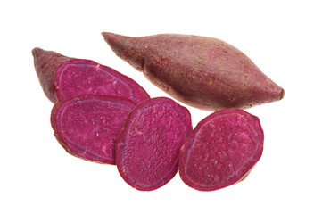 Wall Mural - Purple Colored Sweet Potatoes on White background