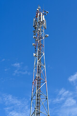 Wall Mural - Top of a telecommunications tower carrying antennas of cellular networks in the Czech Republic